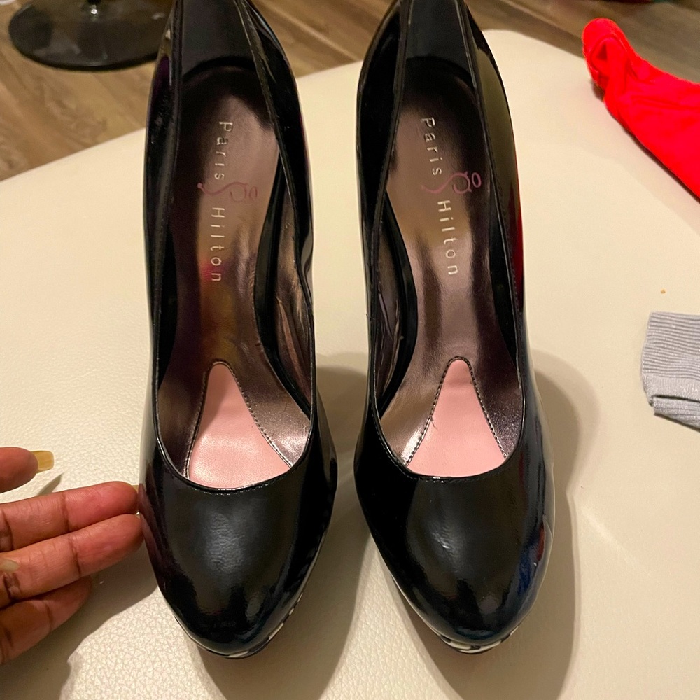 Paris Hilton Black patent platform pump with zebra print heel